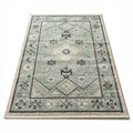Tapis rectangulaire en coton 120 x 180 x 1cm motifs géométriques verts et noirs